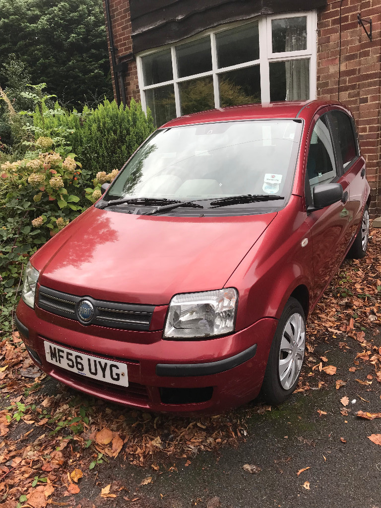 Red Fiat Panda 2006 1.3D with DAB radio and user manual
