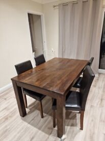 image for Dining table and chairs