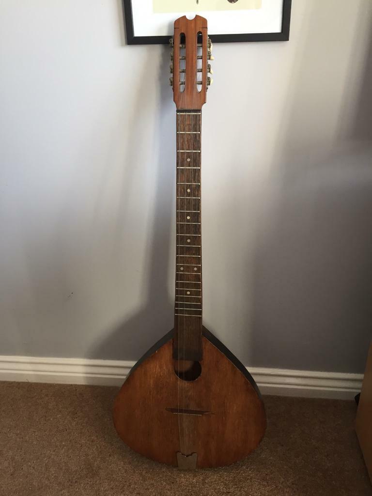 Random musical instrument bouzouki mandolin ?? Make me an offer in