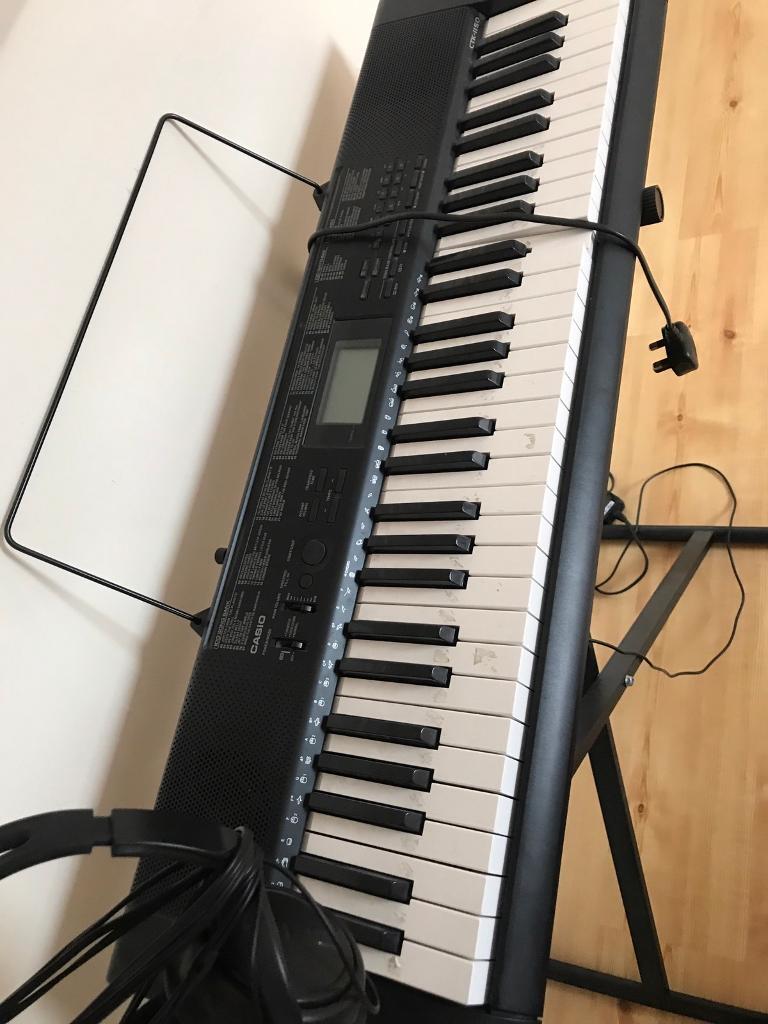 Casio Keyboard CTK1150, 61 keys plus stand and headphones in Hockley