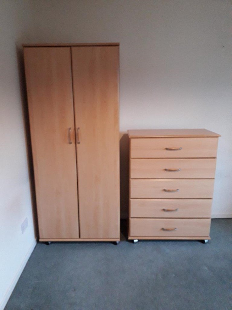 Wardrobe & matching drawers on wheels will sell separately in