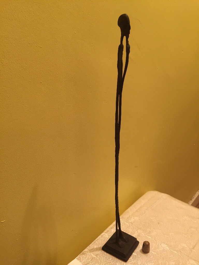 Elongated bronze sculpture of a man in Hyndland, Glasgow Gumtree