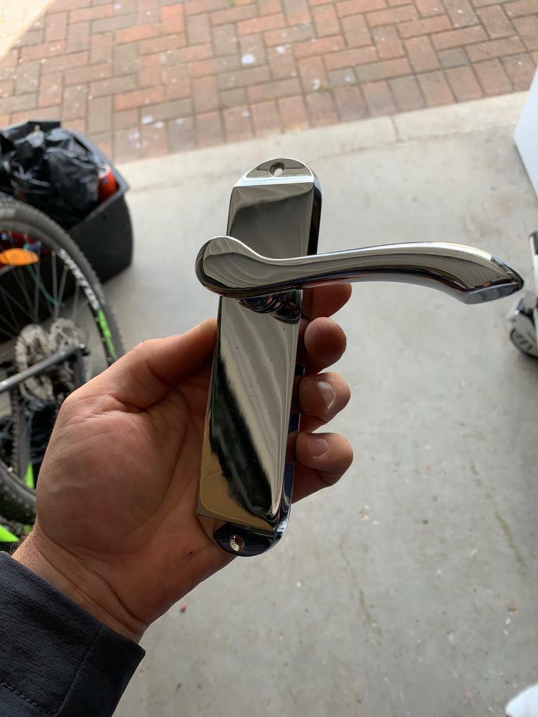 Pair chrome internal door handles brand new in packet with spindal