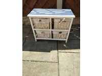 storage cabinet with four baskets