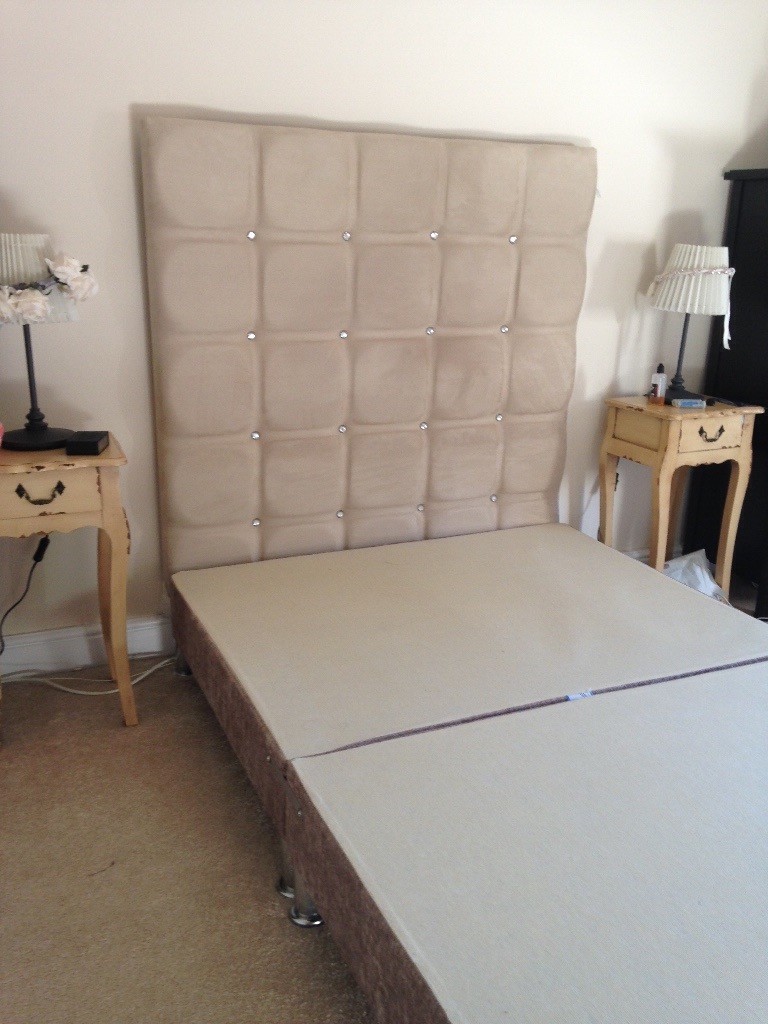 Small double bed base with separate wall mounted headboard in Leith