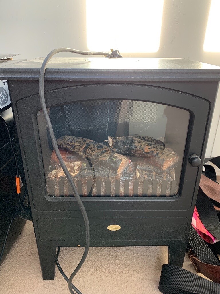 Free standing log burner effect electric fire in Newcastle, Tyne and