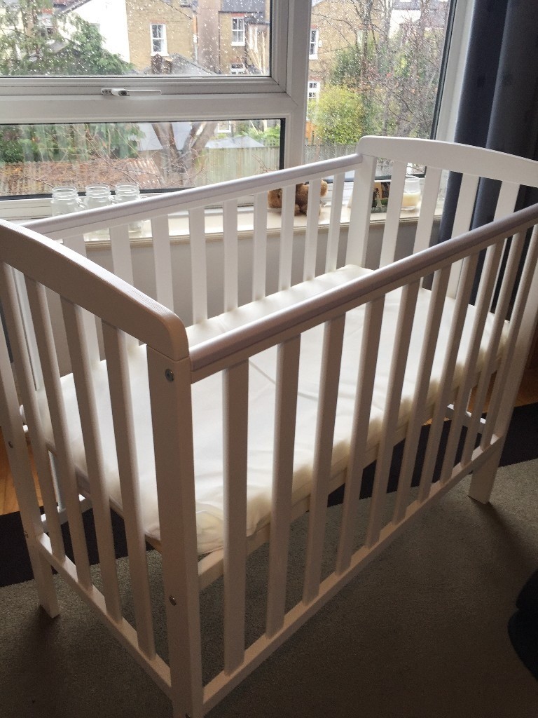 White Compact Baby Cot + Mattress and 2x fitted sheets used for 2