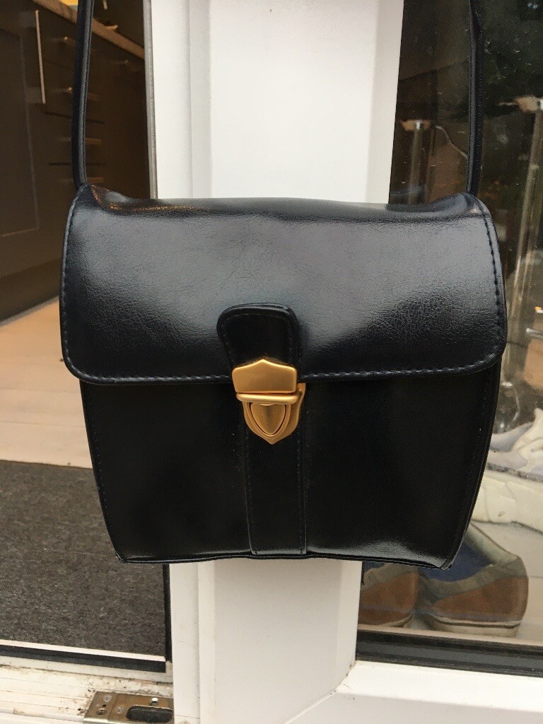 Jane Shilton Clubhouse navy hand bag leather with strap in Ely