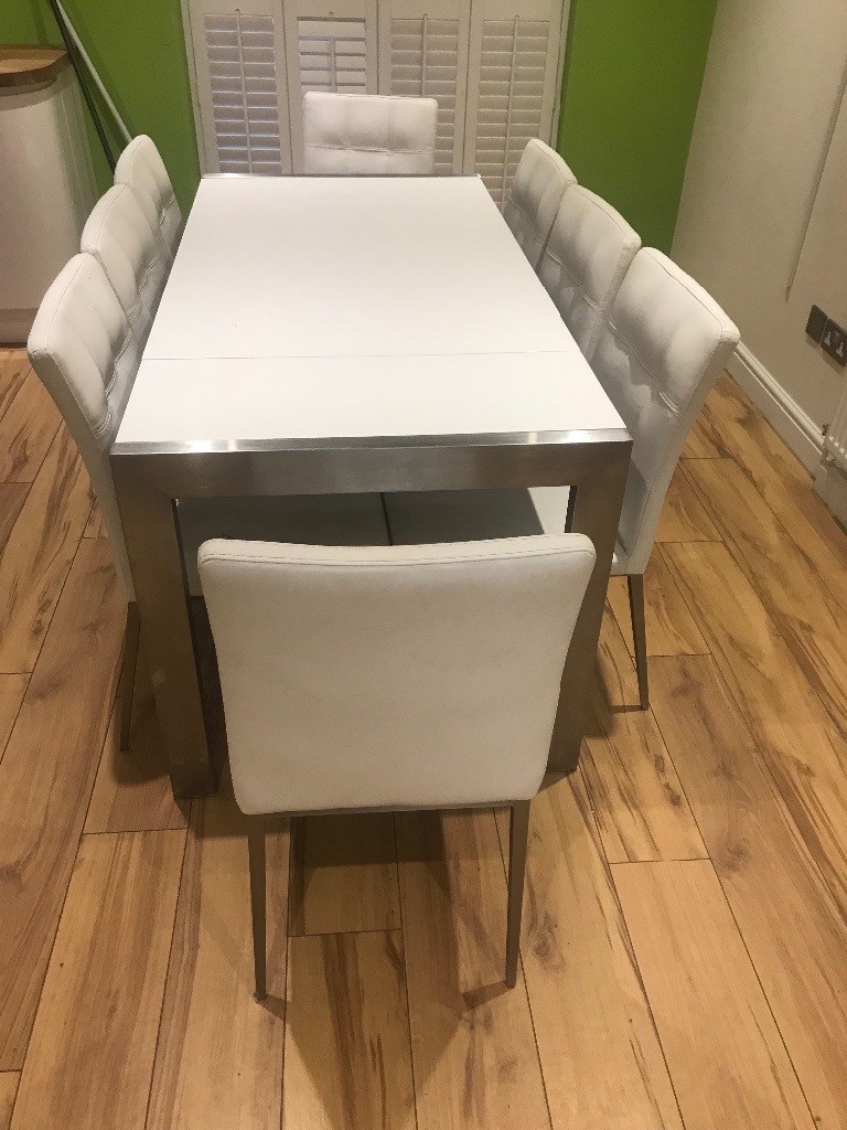 dining table and 8 chairs (can be sold separately) in