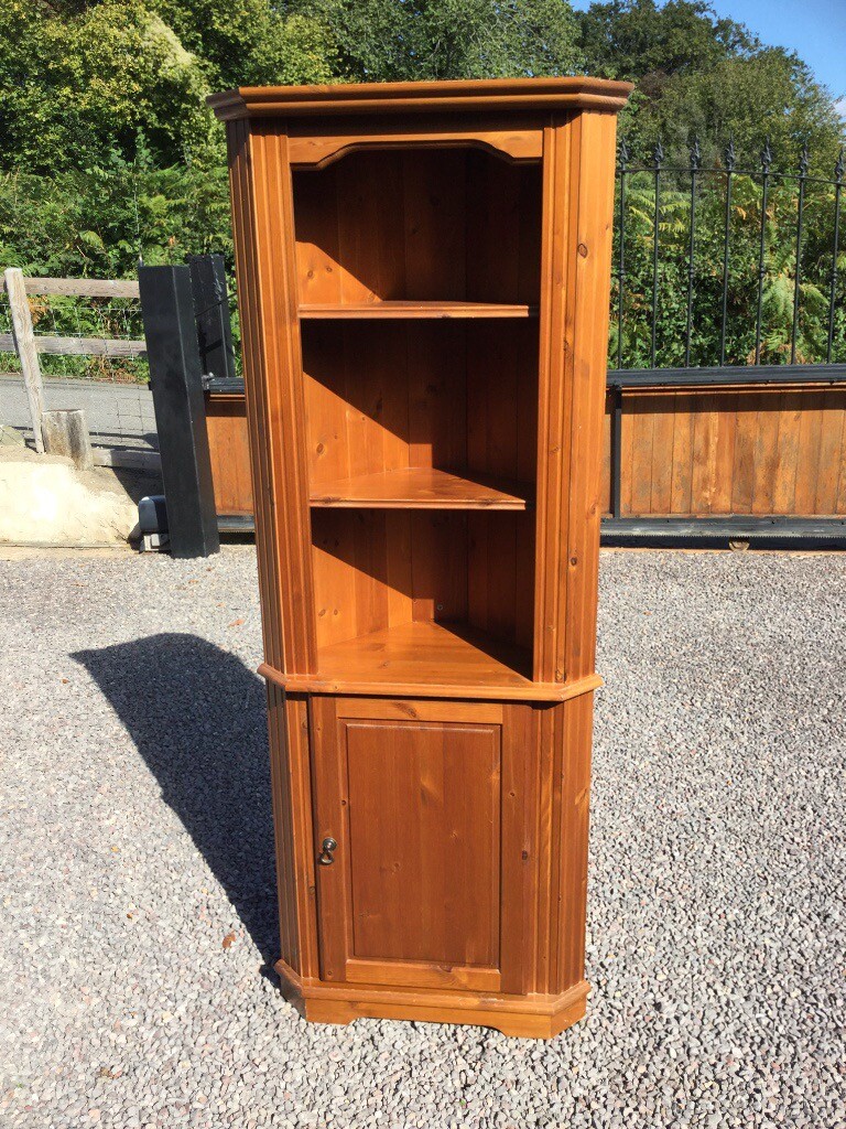 Antique Style solid pine corner shelving unit with cupboard below. in