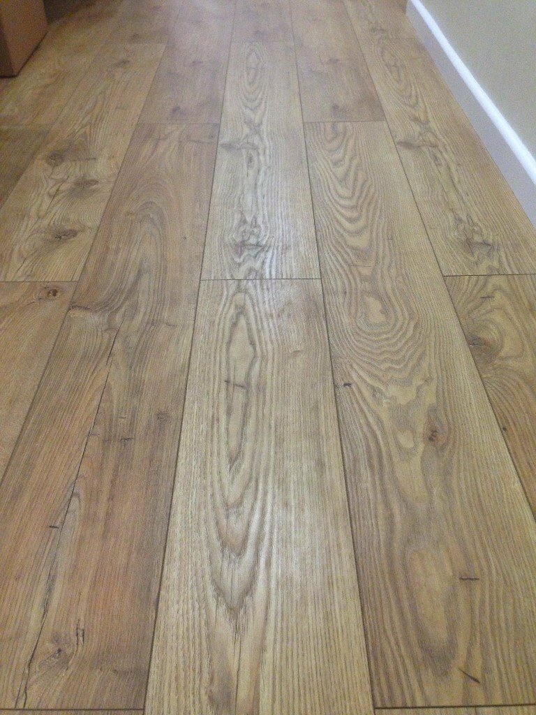 Over 8.5 sq.m natural wood effect laminate flooring, underlay and cork