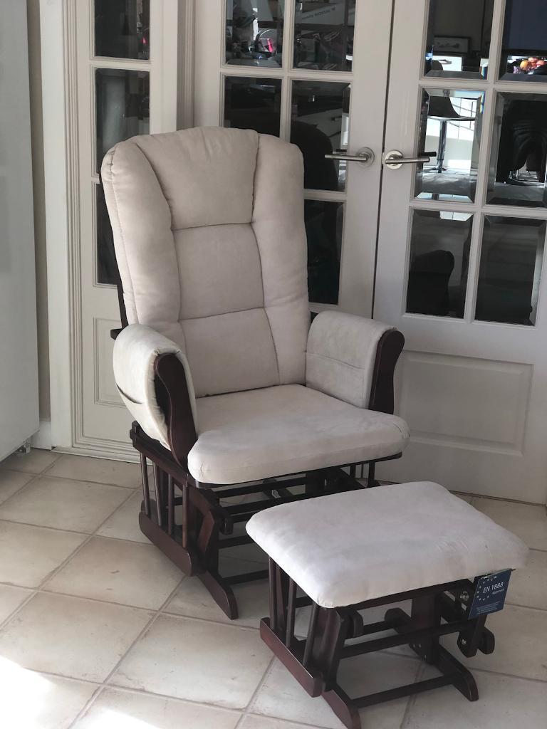 Brand new Hauck rocking glider nursing chair and foot stool antique