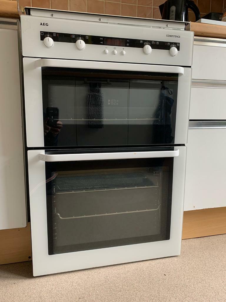 Like new AEG Electric inter grated double oven and separate hob. Need