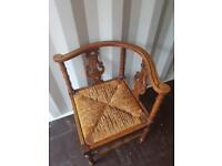 Antique Carved Corner Chair with Rattan Seat 