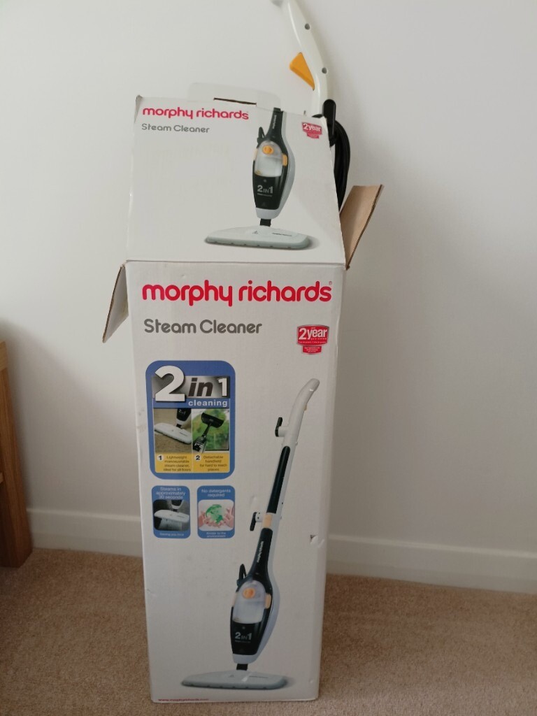 Morphy Richards Steam Cleaner and a window cleaning vacuum in Clapham