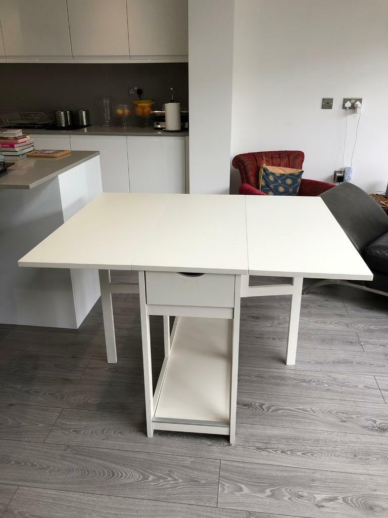 White Extending Dining Table  with a Drawer from IKEA  in 