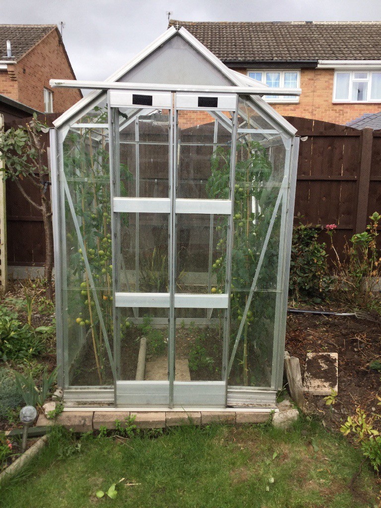 Aluminium greenhouse approx 4ft square. Requires 3new panes of glass