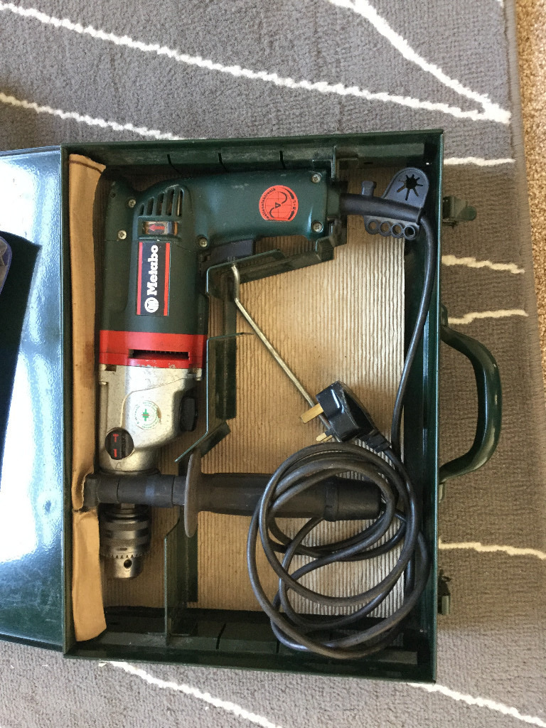 Metabo 750w hammer action drill with metal case and 3 large drills in