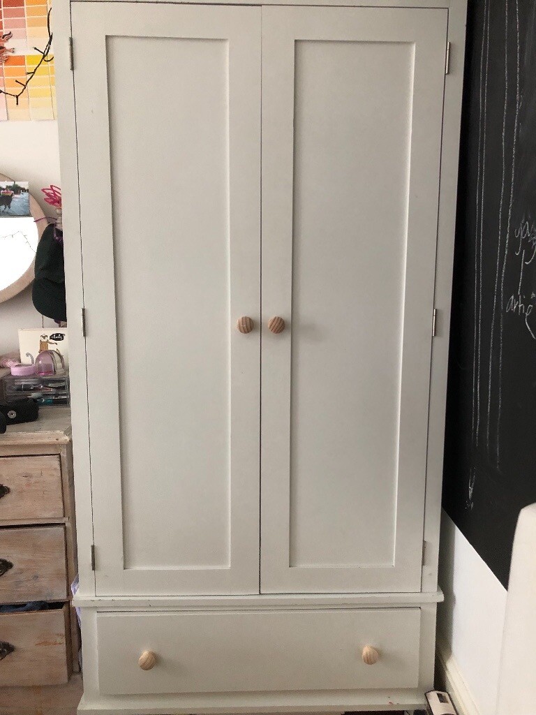 White wardrobe for sale with drawer, solid wood. in Islington, London