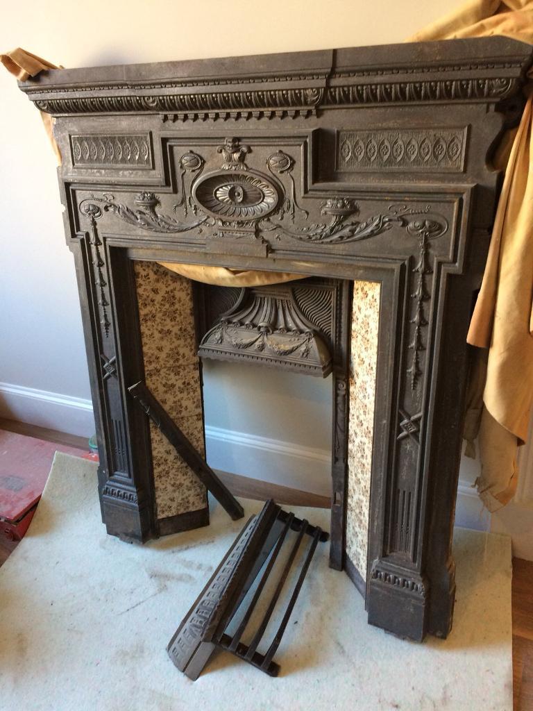 Original cast iron fireplace surround in