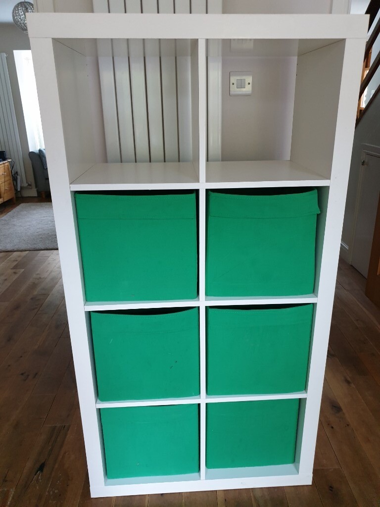 SOLD Ikea Kallax shelving unit with six green fabric boxes in