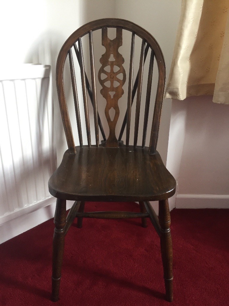 Two vintage spindle backed wooden dining / kitchen chairs in