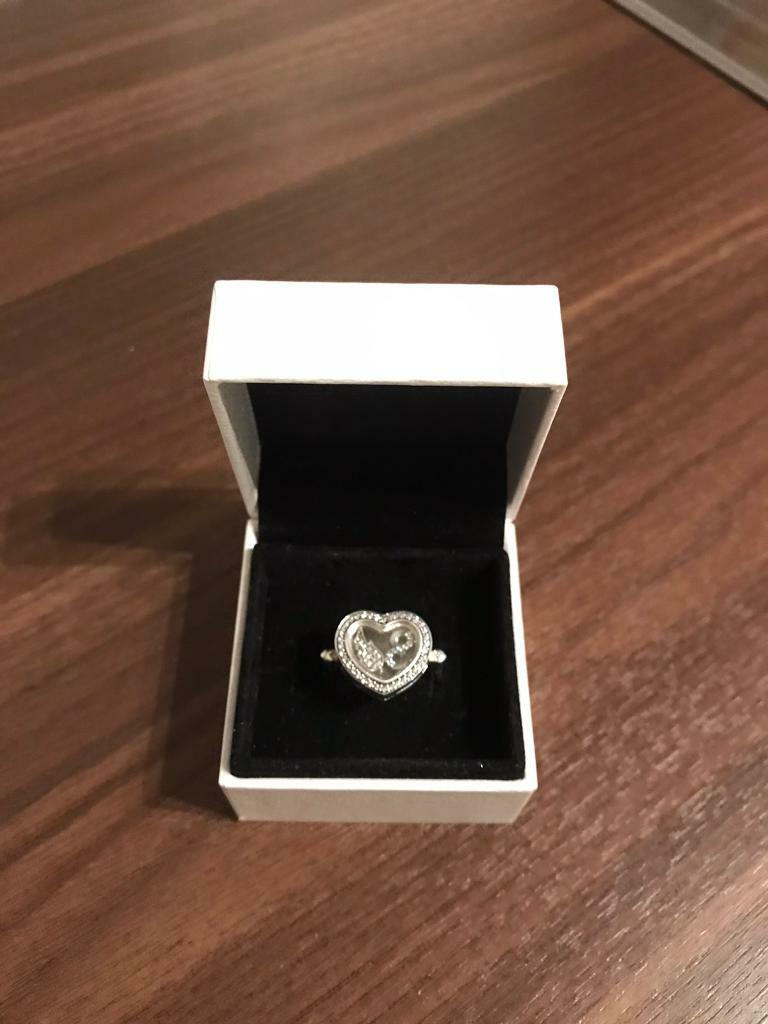 Authentic pandora floating heart locket ring & charms in Crook