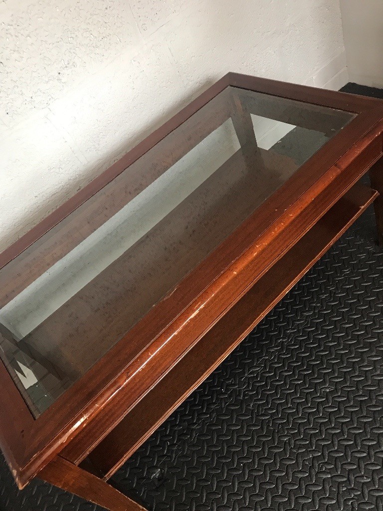 Mahogany coffee table with bevelled edged glass top in Moortown, West Yorkshire Gumtree