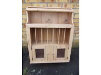 Lovely Big Solid Pine Plate rack. Cupboards under with Glass doors. Top Shelf