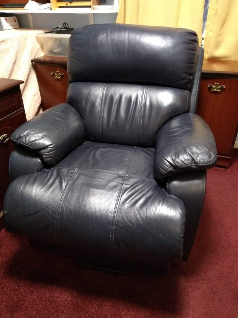 TiMotion Electric Leather mobility riser/ recliner chair. in St