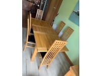 Solid oak wood extendable dining table and 6 high back chairs £299