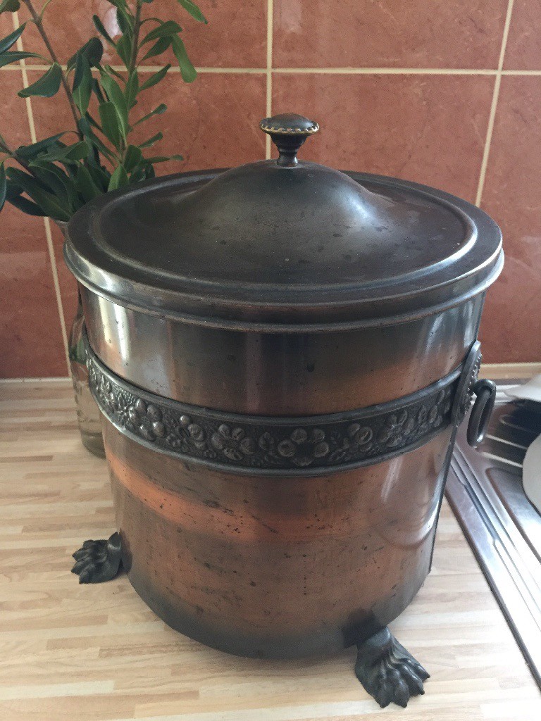Old copper coal bucket with lid and decorative legs in Hull, East