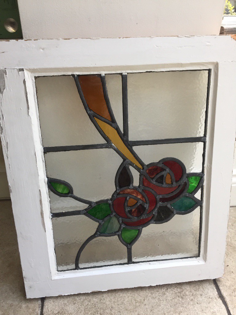 4 original stained glass windows for sale in wood surround. Colours