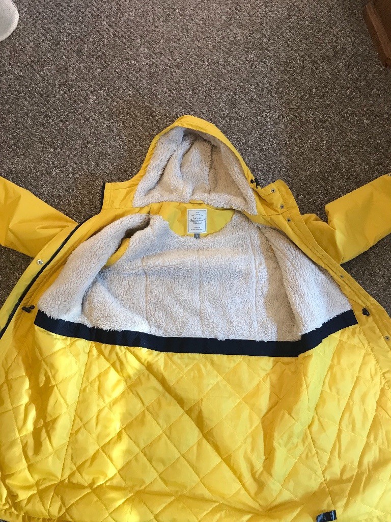Asda women’s Yellow Rain Coat 16 in Newton Abbot, Devon