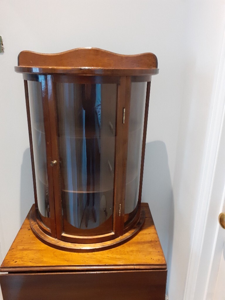 Vintage glass fronted display in Cheltenham, Gloucestershire