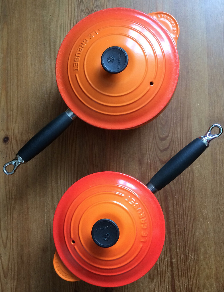 Le Creuset Orange 18cm & 20cm saucepans cast iron in Cricklade