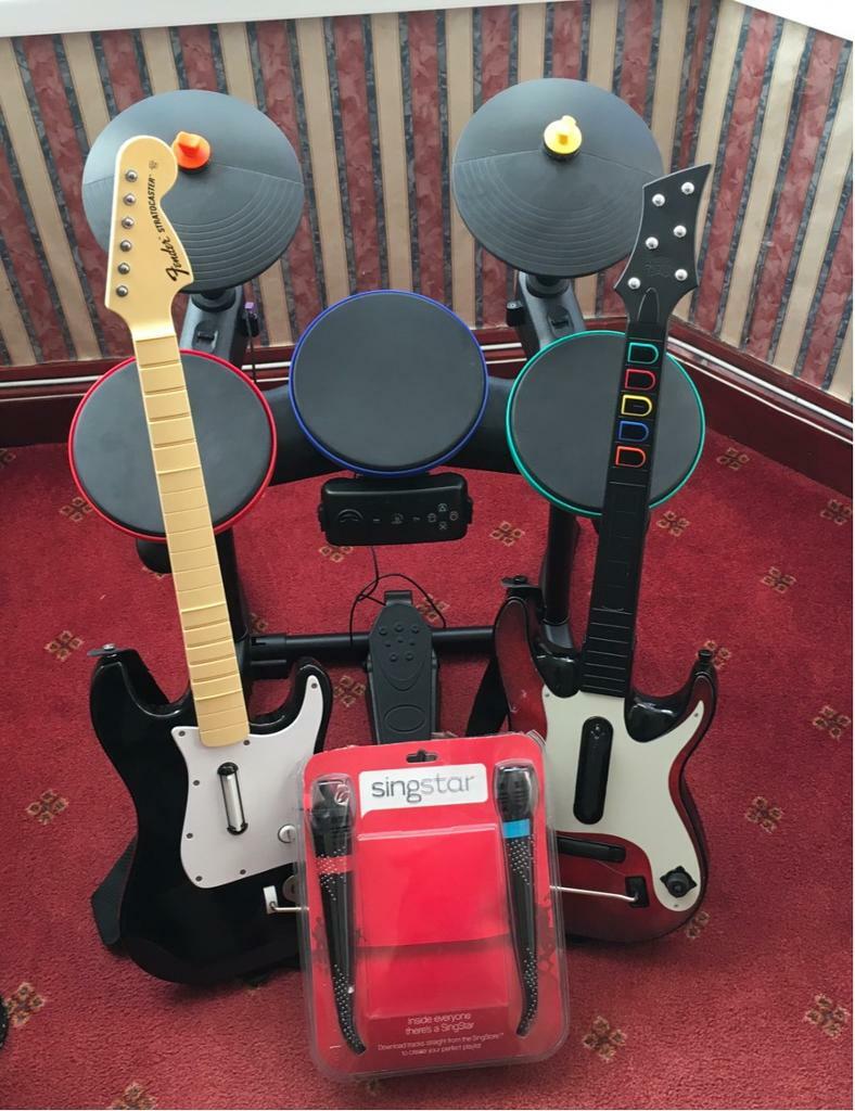 PlayStation 3 Band Hero drums, 2 x Guitar Hero guitars, Singstar
