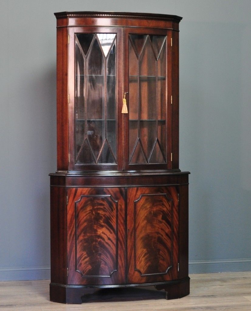 Attractive Tall Vintage Flame Mahogany Corner Display in