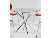 Round glass dining table + 2 grey leather chairs