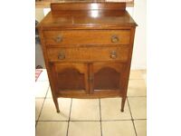 A Nice Small Vintage 1930s Oak Sideboard With cupboard And Two Drawers