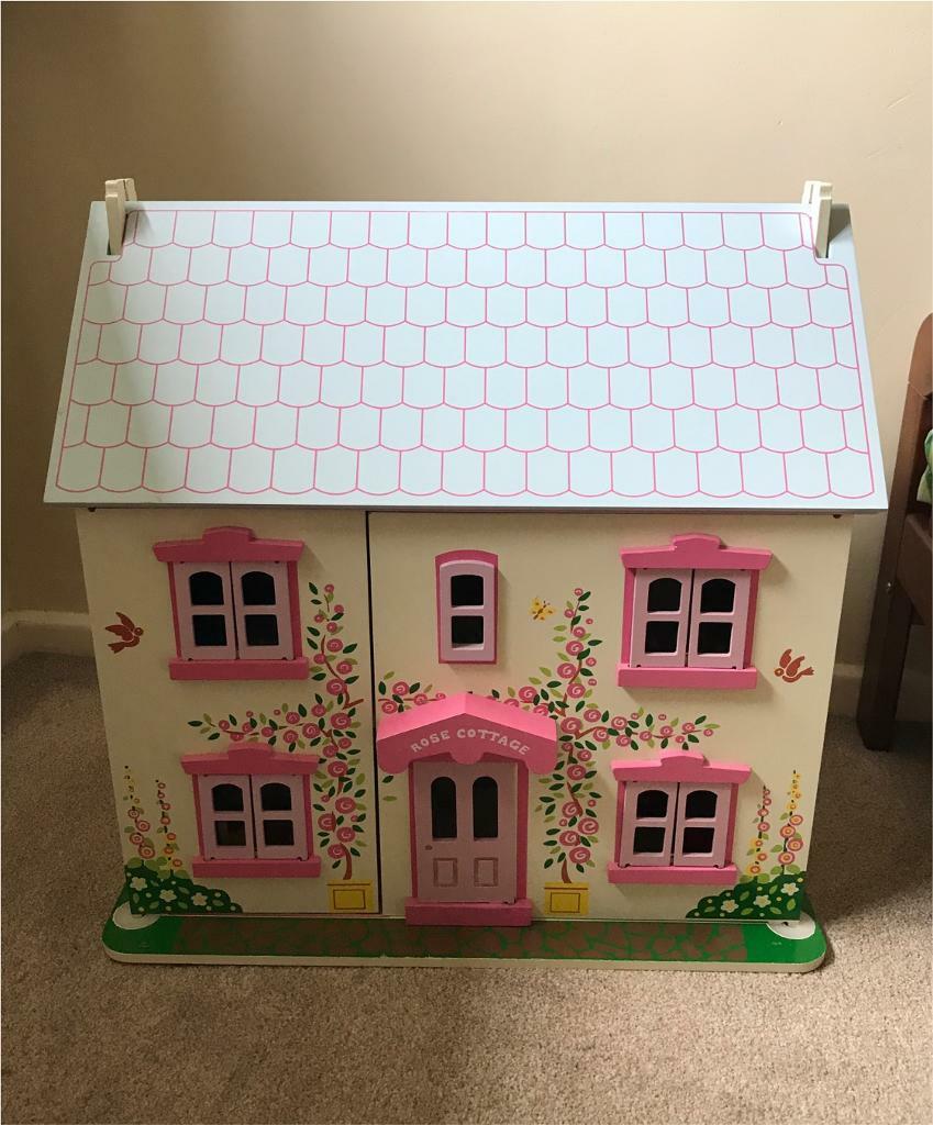 Bigjigs Rose Cottage wooden dolls house with dolls and furniture in