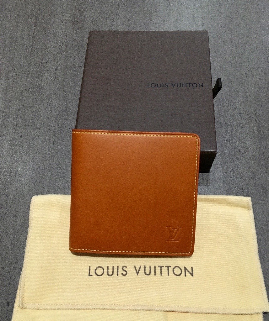 Louis Vuitton Mens Wallet With Coin Compartment In Nomade Leather