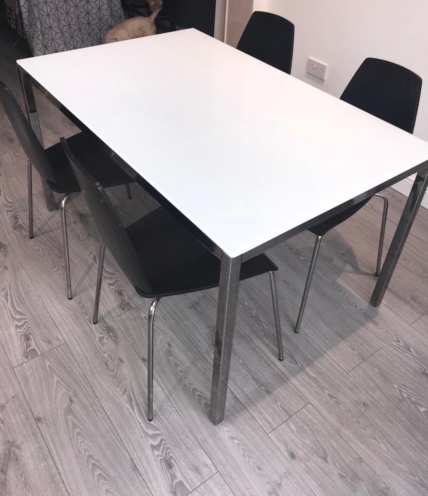 Ikea glass table and black chairs in Hull, East Yorkshire Gumtree