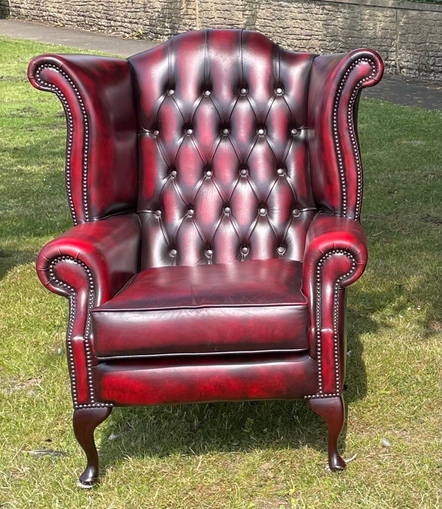 Stunning oxblood leather chesterfield wingback armchair in East