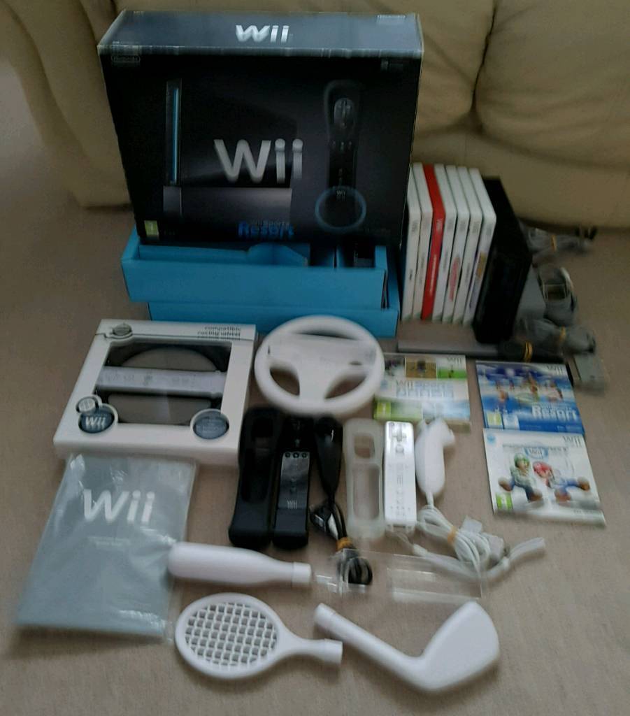 Wii sports resort pack + 10 games inc mario kart & bros in Bramley