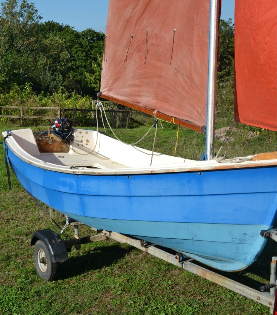 12 ft Sailing dinghy with road trailer and outboard in Narberth