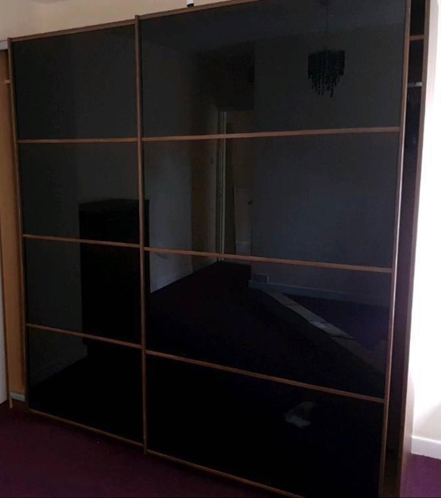 Harveys Walnut Double Sliding Wardrobe With Black Glass Doors Great
