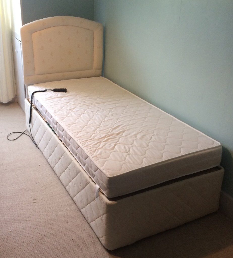 Free for collection a Single electric mobility bed with headboard and