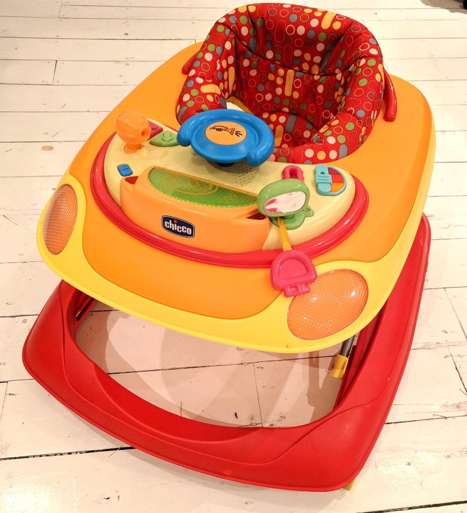 Baby Walker Chicco Brand. Adjustable height. Folds down for easy