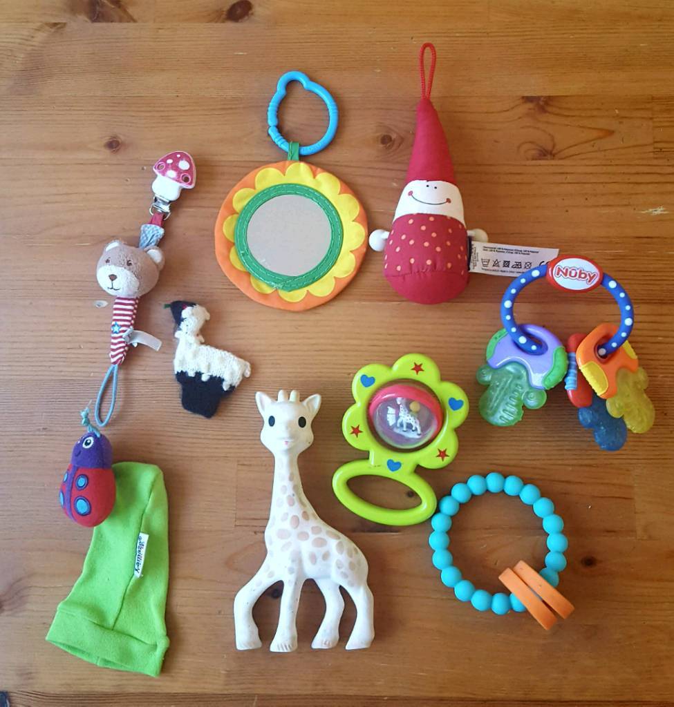 Baby toys including Sophie le giraffe and teethers in Westbury On